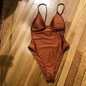 Brand new without tags, never worn forever 21 one piece bathing suit.